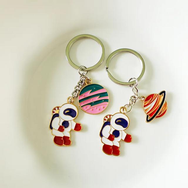 Venta al por mayor, logotipo personalizado, llaveros de esmalte, llavero de metal, llavero lindo de astronauta